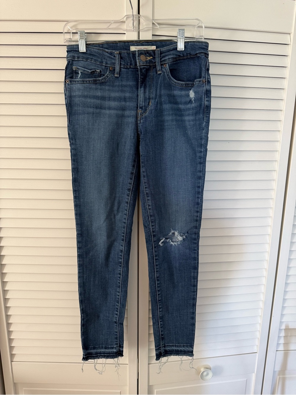 Levi's Dark Blue Cropped Distressed Skinny Jeans